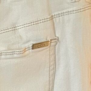 Chico so slimming white size 12 jeans only worn once dry cleaned after wash